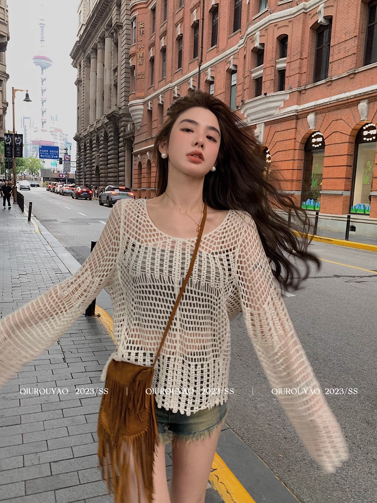 Qiu Rouyao new spring pullover top, loose earring design, slimming long-sleeved hollow sweater for women