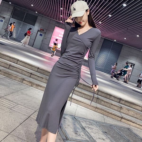 Spring and Autumn temperament V-neck drawstring long-sleeved dress for women Korean version slimming mid-length slit hip skirt ins trend