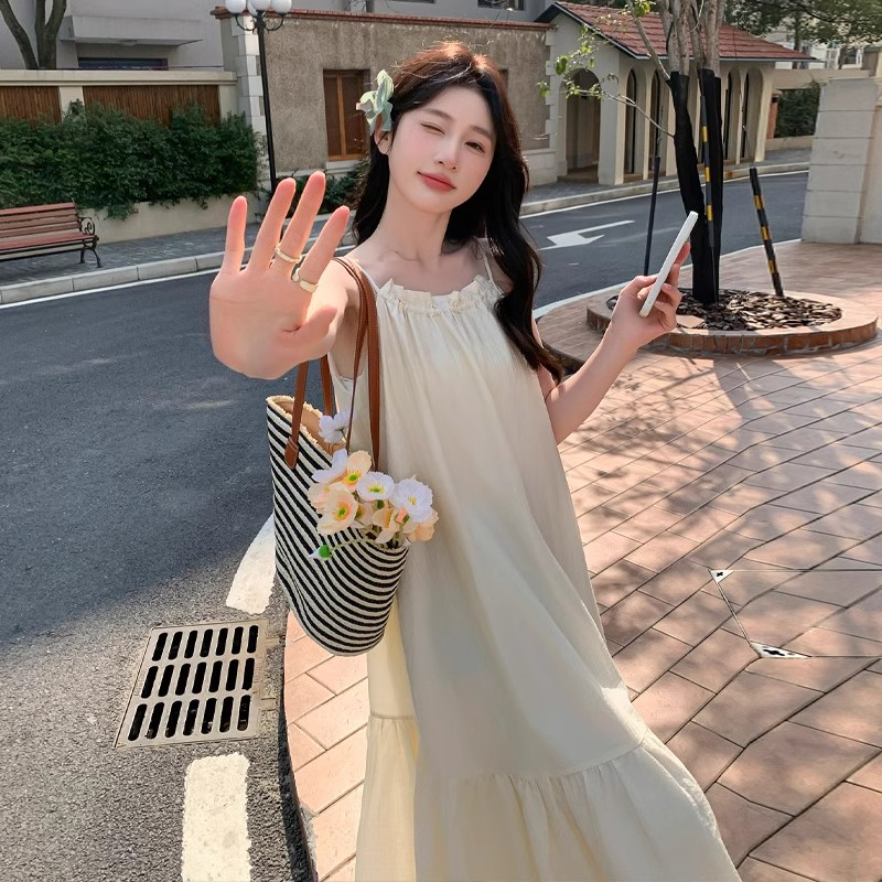 Off-white suspender dress for women 2024 summer new style French high-end temperament super fairy seaside vacation long dress