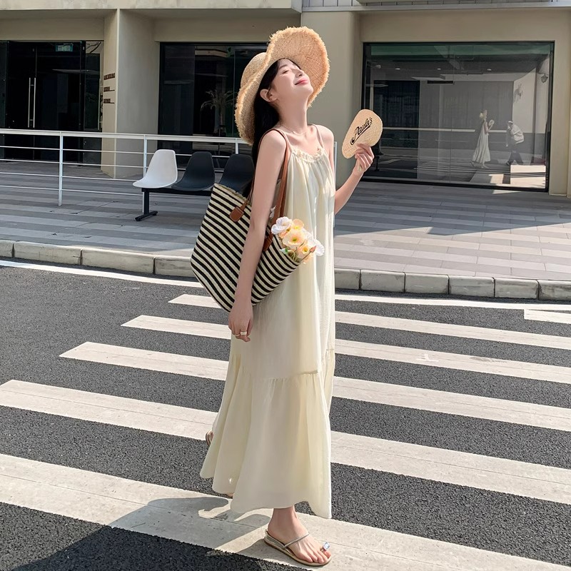 Off-white suspender dress for women 2024 summer new style French high-end temperament super fairy seaside vacation long dress