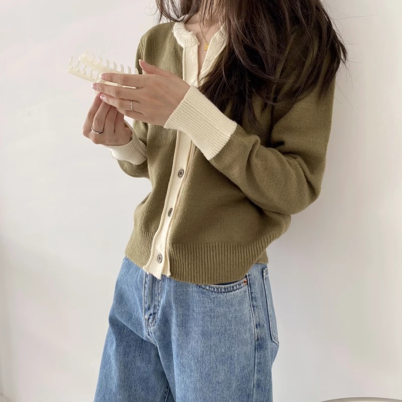 A large number of Tmall quality loose design niche contrasting color thickened knitted sweater coat cardigan