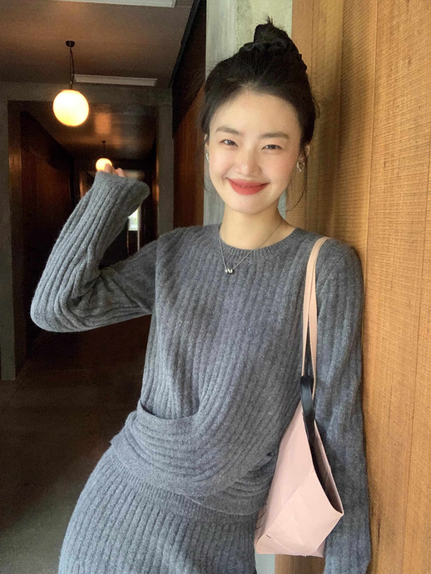 Black crew neck sweater for women, design and temperament sweater top, high waist, mid-length, hip-hugging skirt, two-piece suit