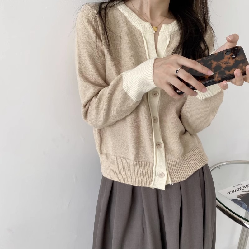 A large number of Tmall quality loose design niche contrasting color thickened knitted sweater coat cardigan